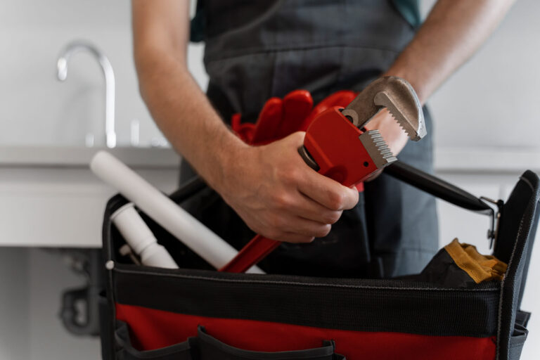 plumber with toolbox
